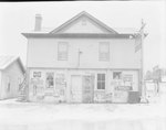 Community Store. Front view, advertising cold medicine, soda, cigarettes, etc. by William Garber