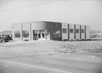 Front view of Timberville Department Store, under construction, alternate view. by William Garber