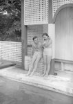 Man and woman standing on the side of the swimming pool at the Shenandoah Alum Springs Hotel. Orkney Springs, Va. by William Garber
