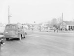 Intersection at Kamp Washington, Fairfax, Va., with a police officer directing traffic by William Garber
