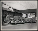 View of six of the trucks belonging to Triplett and Vehrencamp. Mt. Jackson, Va. by William Garber