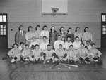 Timberville (High) School, men's baseball team posing with their coach in the basketball gym by William Garber