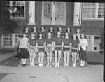 Broadway (High) School, women's basketball team posing in front of the school. by William Garber