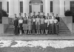 Broadway (High) School, a group of young men and women standing on the front steps. by William Garber