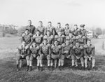 Massanutten Military Academy. A football team sitting outdoors by William Garber