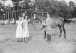 Timberville Horse Show, two men and two young women standing next to a horse with a ribbon by William Garber
