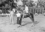 Timberville Horse Show, two men and a woman posing with a horse wearing a ribbon by William Garber