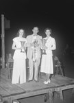 Timberville Horse Show, two women and a man standing on a platform holding ribbons and trophies by William Garber