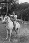 View of a man on a horse, holding a lance. Natural Chimneys, Mount Solon, Va. by William Garber