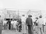Crowds of people at the Shenandoah County Fair, with banners advertising the "Alters Brothers United Assembly of the World's Strangest People" by William Gaber