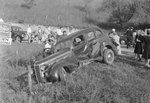 A damaged vehicle stuck in a ditch, VA license plate 57-919 by William Garber