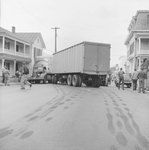Rear view of an accident involving a tractor-trailer and a pick-up truck by William Garber