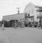 Front view of a tractor-trailer that has been in an accident by William Garber
