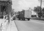 Distant view of a tractor-trailer that has suffered a bad accident by William Garber