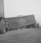 View of a multi-tractor-trailer accident on a rural road with a close up view of the H.P. Welch Co. truck by William Garber